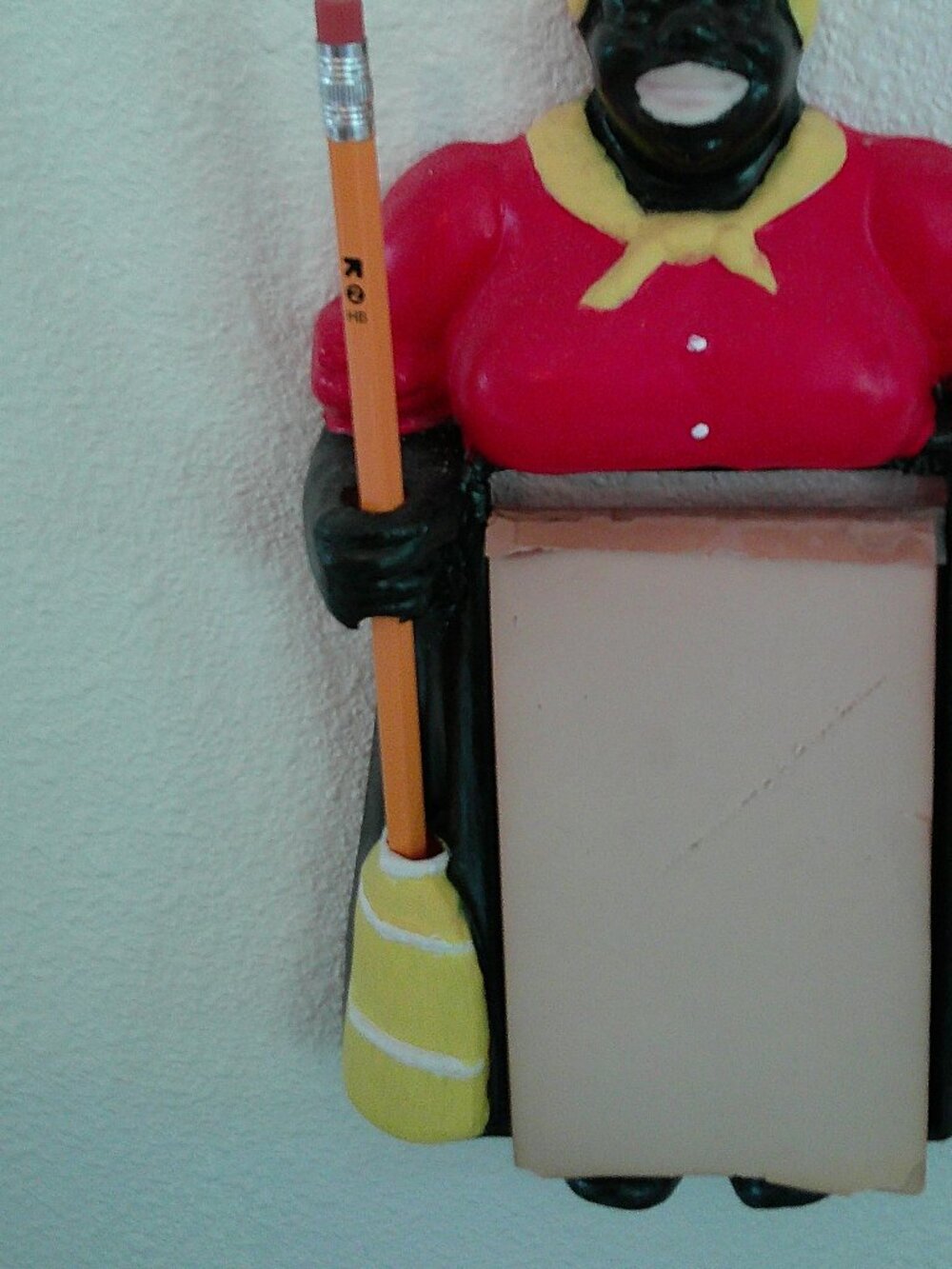 Vintage, has been repainted Aunt Jemima hanging memo pad plastic.
